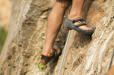 How do you break in climbing shoes fast